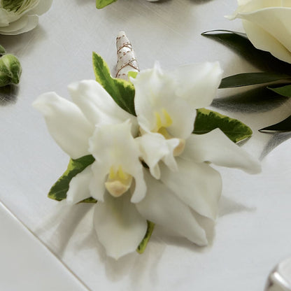 White Mini Cymbidium Boutonniere –  Evergreen Flowers, Tucson AZ